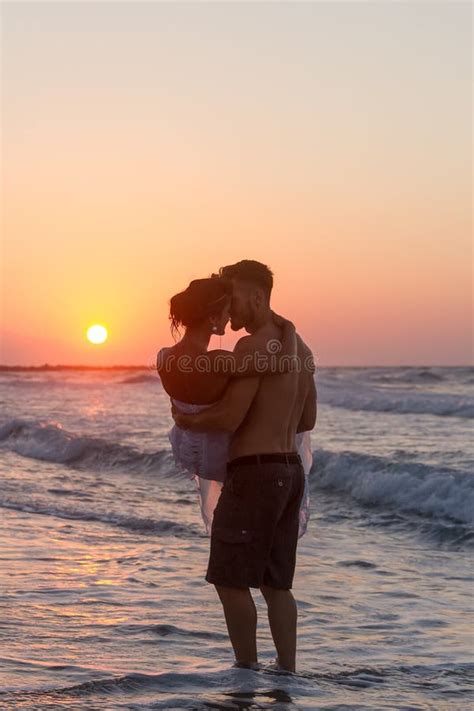 Oung Couple Teasing One Another At The Beach Stock Image Image Of Relationship Beach 36014363