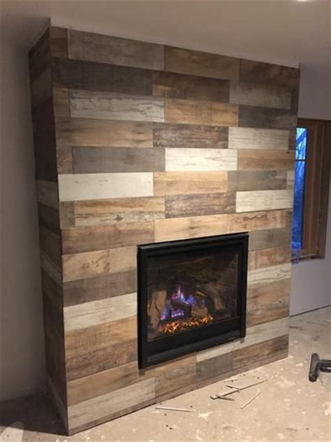 A wood fireplace mantel is the fireplace decoration ideas from american craftsman style. 27+ Stunning Fireplace Tile Ideas for your Home - Simply Home