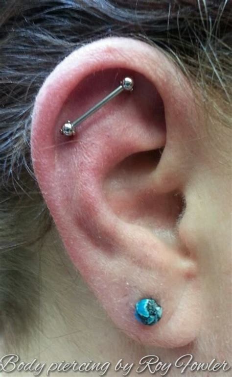An outer helix piercing connected to a forward helix the first reference to the industrial piercing (then termed industrial ear project) was in. Pin on TATTOOS & PIERCINGS!