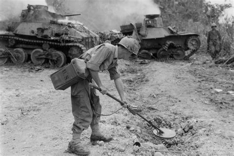 Type 95 Ha Go Tanks And California National Guardsman Sweeps For Mines