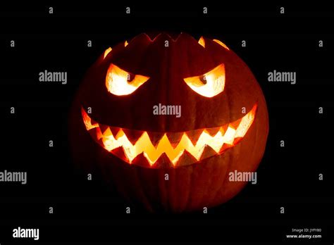 Round Halloween Pumpkin Smile With Hot Burning Fire Eyes Mouth The Big