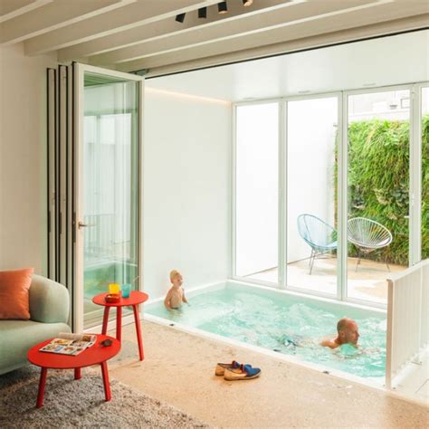 Once upon a time, when it came to pool design you had two choices: Small Indoor Pool nested in a Tiny Minimalist Belgium House | | Founterior