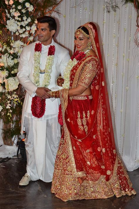 bollywood tollywood and más bipasha basu and karan singh grover wedding bridal lehenga red