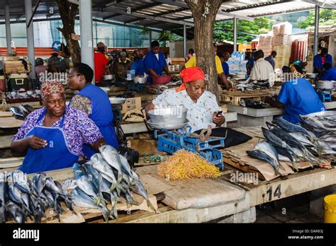 Africa Mozambique Maputo Women Selling Fish In Market Stock Photo