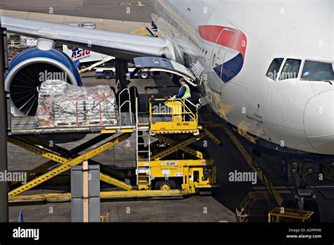 Loading Cargo Into An Aeroplane At The British Airways Passenger Stock