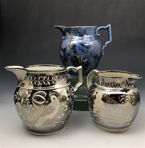 Silver luster pottery pitchers with resist decoration English circa ...