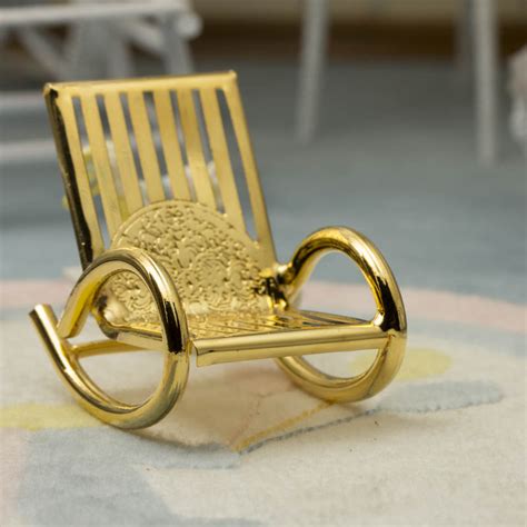 Even if space is at a premium, you can still be delighting in the hypnotic relaxation a modern rocking chair offers as the is effortless to incorporate into any corner with its modest size. Miniature Gold Rocking Chair - Miniatures Sale - Sales