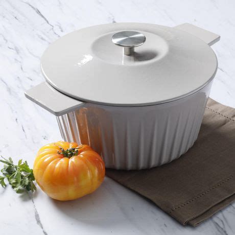 I have two of the 2 qt and a 5 qt. "Martha Stewart 5-Quart Round Enameled Cast Iron Dutch ...