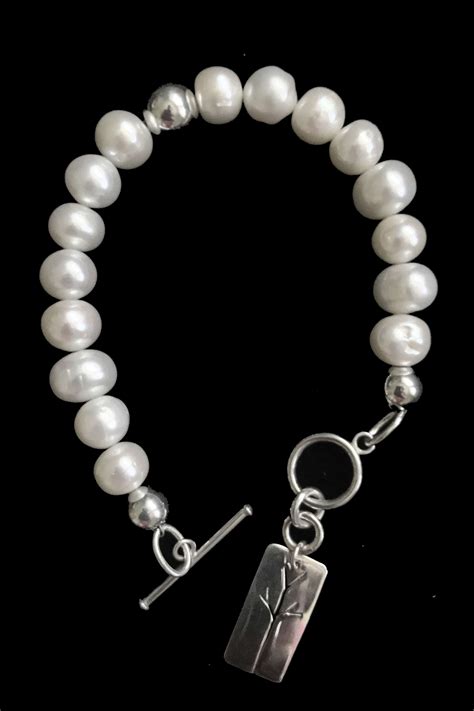 Pearl Bracelet With Sterling Silver Charm Elysium Inc