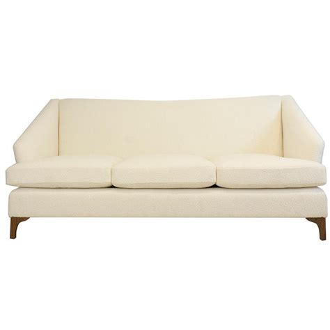The holly fabric sofa by flexsteel features tall, tapered wood legs, a modern frame, & thin, upward curving arms. Tall Back Tight Back Winged Sofa with Walnut Legs and Wool ...