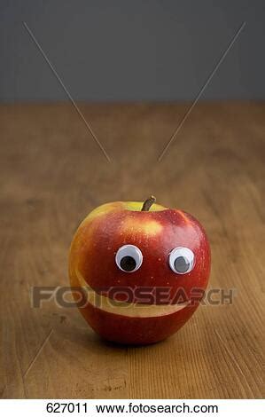 Product catalog slideshow video maker for a lamp company. An apple with a smiley face Stock Image | 627011 | Fotosearch