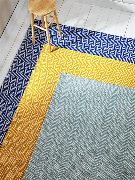 With A Simple Geometric Inspired Weave Our Cool Eau De Nil Rug Will