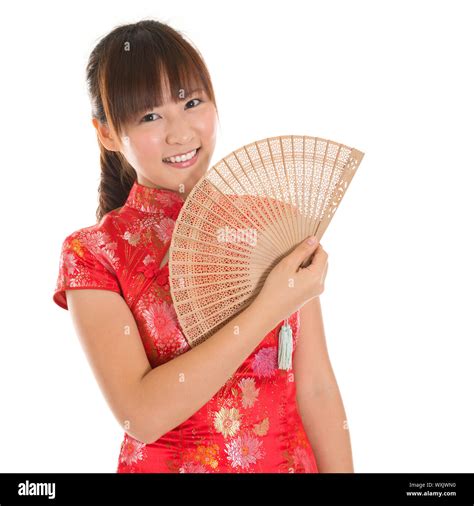 Asian Woman With Chinese Traditional Dress Cheongsam Or Qipao Holding