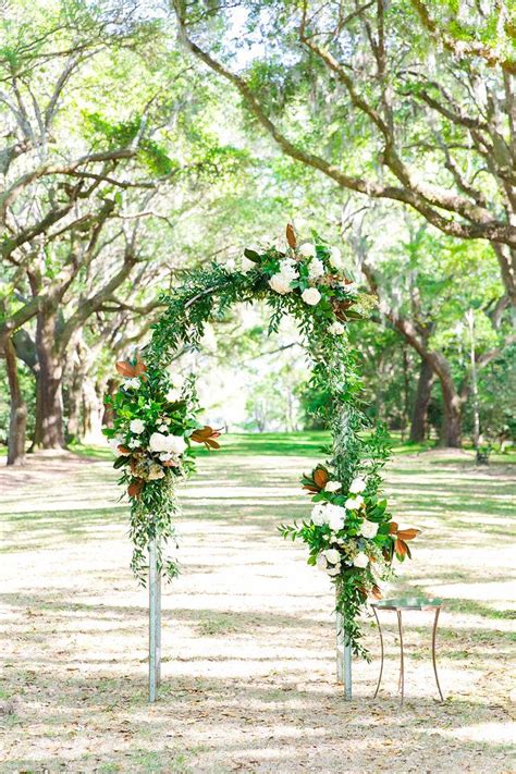 Arch With Greenery Roses And Magnolia Leaves Dana Cubbage Weddings
