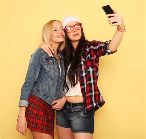 Two Teenage Female Friends Taking A Selfie Outdoors Stock Image Image Of Adult Europe 146725183