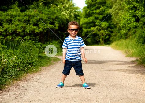 Adorable Kid Posing For The Camera Is Excited For The Summer Vacation