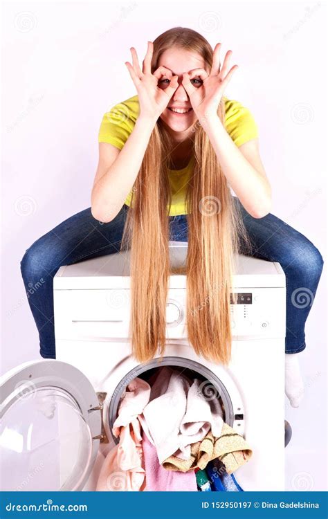 Beautiful Girl Sitting On Top Of The Washing Machine Washing Machine