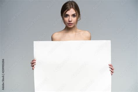 Sexy Naked Girl With A Poster Clean Skin Hair Removed Isolate For Advertising And