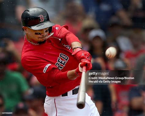 Mookie Betts Of The Boston Red Sox Hits An Rbi Sacrifice Fly Scoring