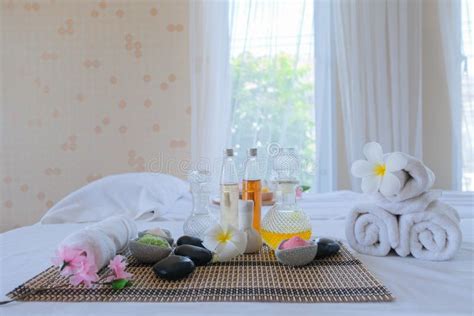 Spa Treatment Set And Aromatic Massage Oil On Bed Massage Thai Setting For Aroma Therapy And