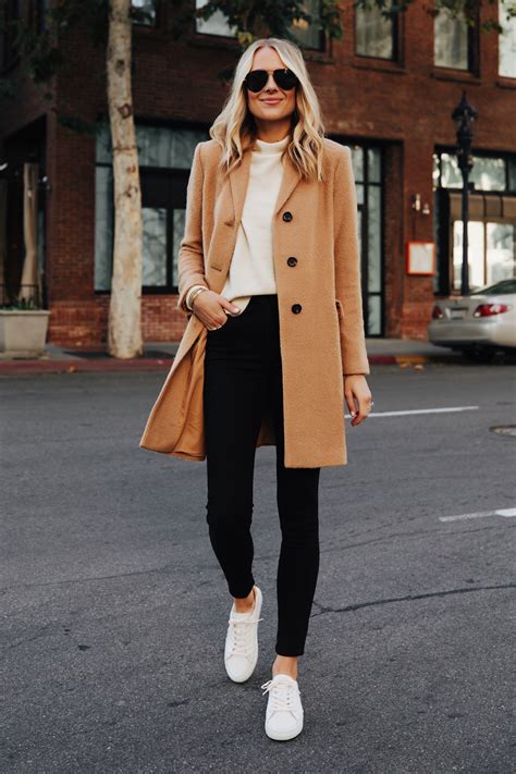 Update your casual style by wearing a camel coat over blue chambray shirt tucked in grey skinny jeans completed with fur black leather loafers. An Easy Outfit to Recreate With Your Camel Coat | Fashion ...