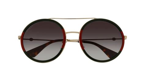 gg0061s sunglasses by gucci shape round material metal frame type full rim color gold