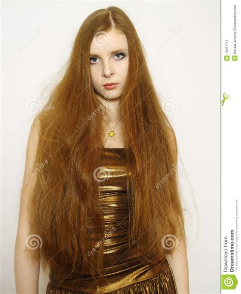 Young Woman With Long Red Hair In Dress Stock Image