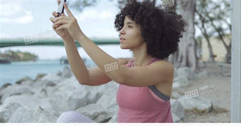 Casual Black Girl Taking Selfie On Riverside Stock Video Footage