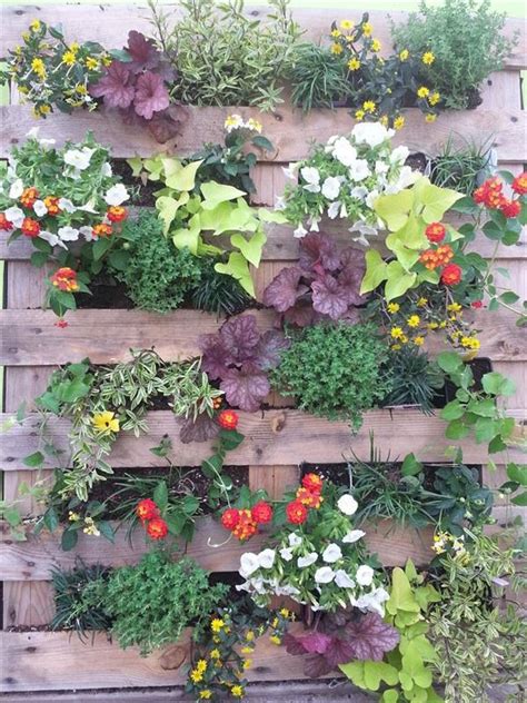 Below are the basic instructions for how to make a vertical garden planter using scrap wood and a pallet. Pallet Garden - Landscaping with Pallets | Pallet ...