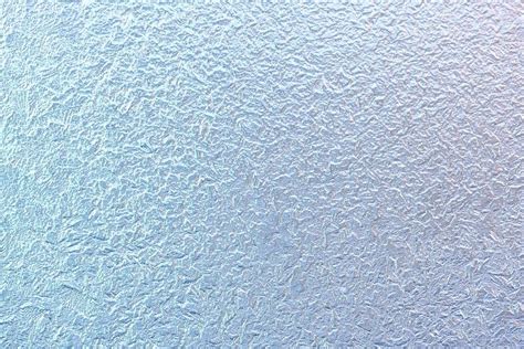 Frost Patterns On Window Glass In Winter Frosted Glass Texture Blue