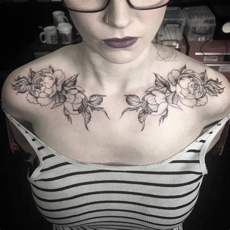 Although it's still a tougher area to have a tattoo, comparing to other parts of the body, the chest isn't a terribly painful place to get one, and they are well worth it as. Love the placement of this one. Also symmetry is beautiful ...