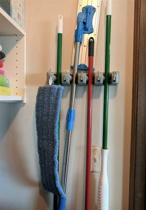 Free shipping on all orders over $35. A mop and broom rack ideal for cleaning supplies. It'll ...