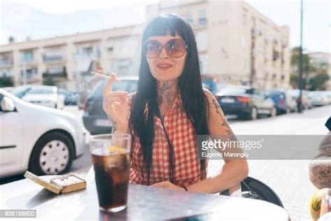 Mature Woman Smoking Cigarette Stock Fotos Und Bilder Getty Images
