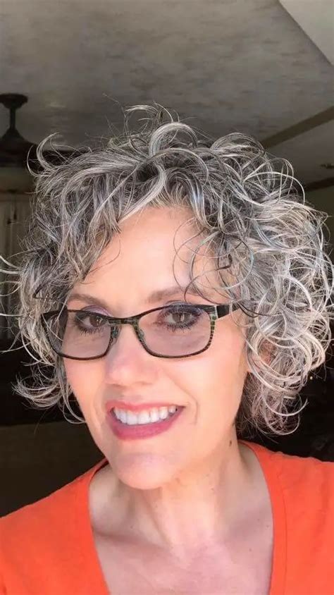 Cute Curly Hairstyle For Over 60 Women With Glasses And Grey Hair 21