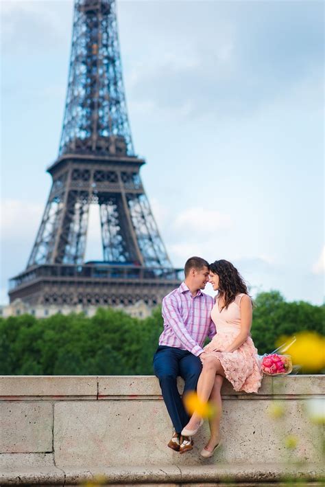 Cute Couple In A Romantic Moment In Front Of The Eiffel