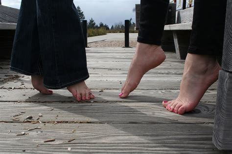 Beautiful Barefoot Girls Girls Show Off Their Bare Feet Together