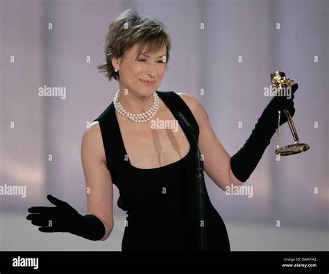 The Actress Corinna Harfouch Holds Her Trophy In Her Hand At The Award Ceremony Of The 42nd