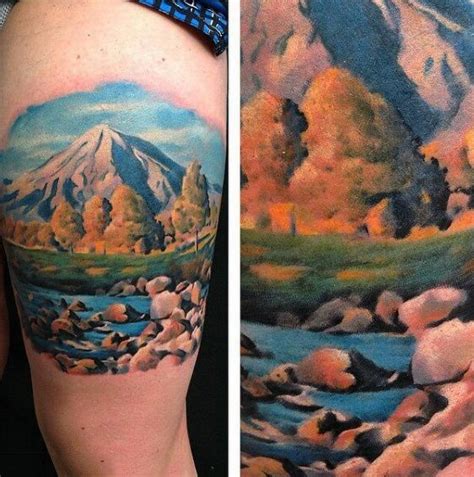 Males Watercolor Upper Arm Tattoo Of Mountainscape With Rushing River