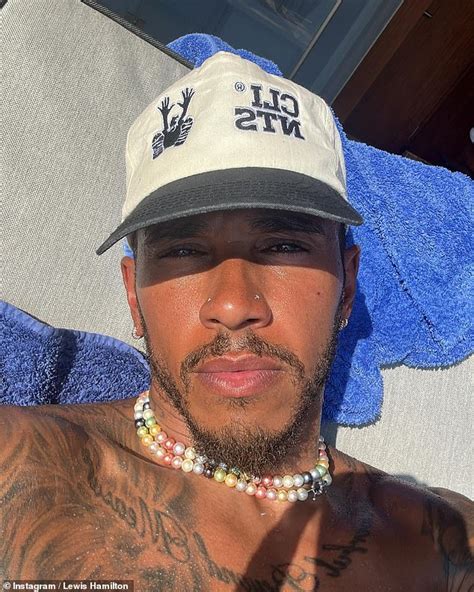 Lewis Hamilton Shows Off His Ripped Physique As He Enjoys A Hot Air