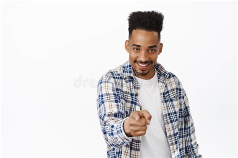 Cheeky African American Man Smiling Pointing At Camera With Confidence