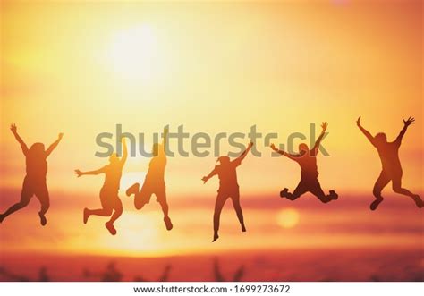 happy friend jumping tropical sunset beach stock illustration 1699273672 shutterstock