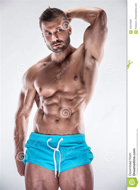 Culturista Dell Uomo Che Mostra Ente Muscolare Immagine Stock Immagine Di Uomo Barba