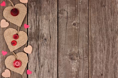 Side Border Of Valentines Day Burlap Hearts Over Rustic