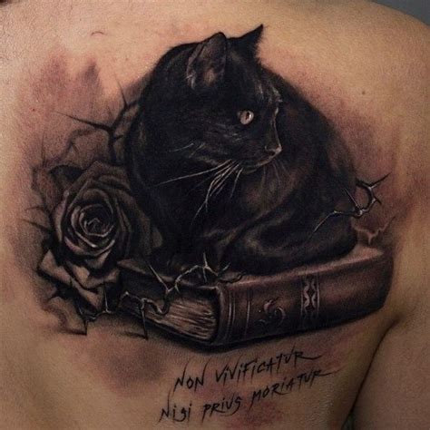 Black Cat Sitting On A Book Tattoo Tattooimagesbiz Tatouage Chat