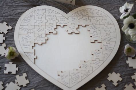 The puzzle comes with a card explaining to guests what to do. Wooden Heart Jigsaw Puzzle Wedding Guest Book - The ...