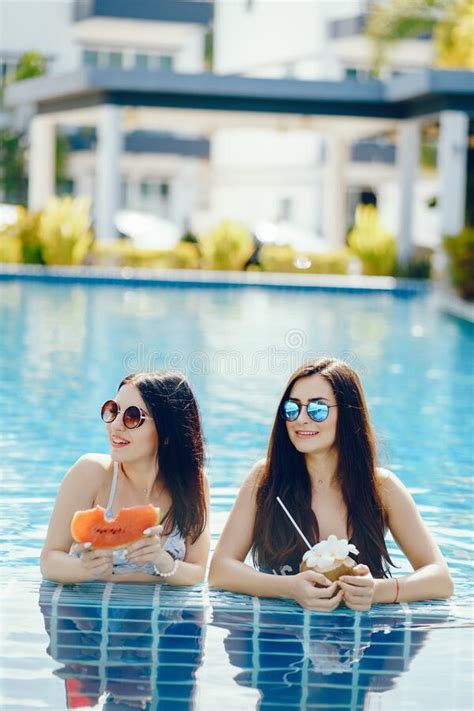 Two Girls Having Fun By The Pool Stock Image Image Of Fitness