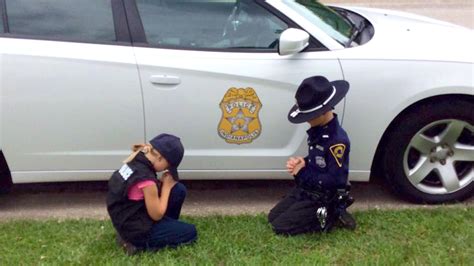 Powerful Photo Shows Children Of Police Officer Praying He Comes Home