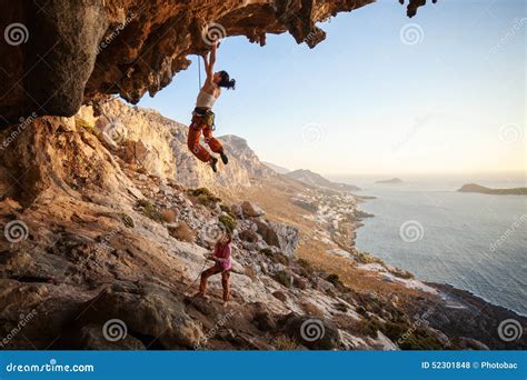 Young Woman Lead Climbing On Overhanging Cliff Stock Photo Image Of