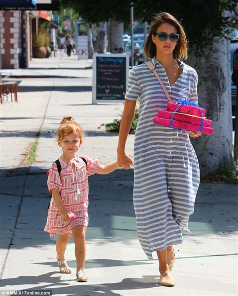 Jessica Alba Takes Daughter Haven To A Birthday Party As They Coordinate In Striped Dresses
