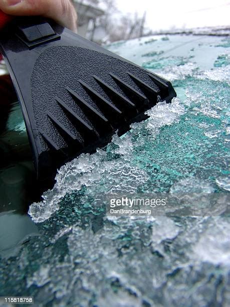 Scraping Ice From Car Photos And Premium High Res Pictures Getty Images